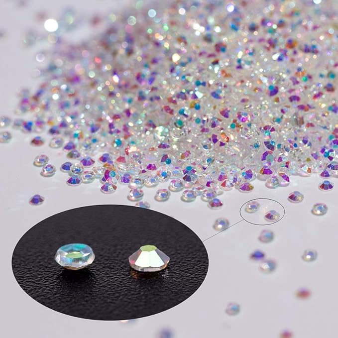 10000Pcs Tiny Rhinestones 1.2mm Clear AB Flatback Glass Pixie Crystals, Iridescent Gems Long Lasting Shine Small Sugar Beads Dust Charms for Nail Design DIY Crafts Accessories